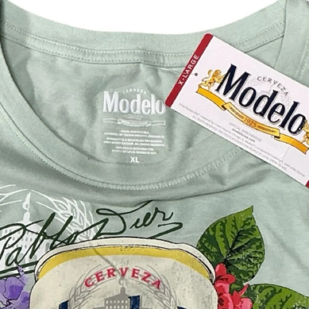 Modelo - NWT - Light Green T-Shirt with Floral Graphic - Picture 2 of 3